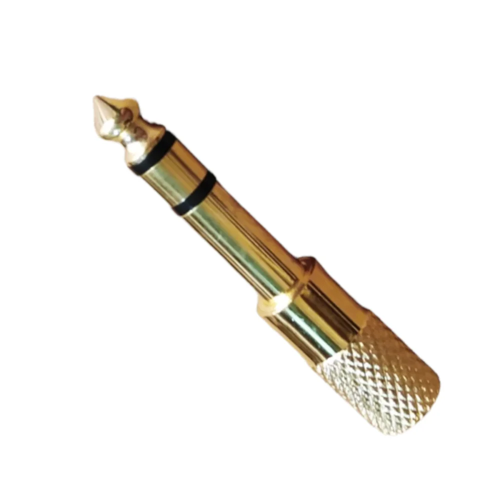 Adaptador dorado 3,5 mm a plug 1/4 estéreo DORA-3-5 para audio profesional