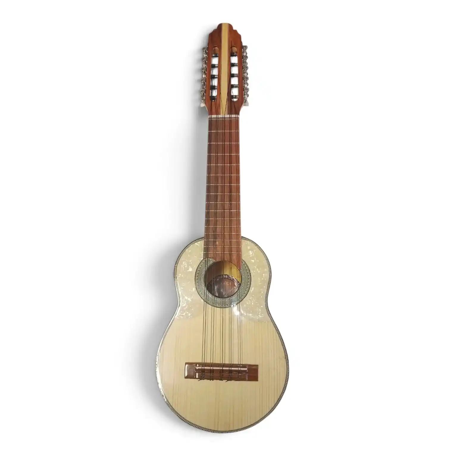 Cream-colored acoustic guitar photographed upright, showing long wooden neck, fretboard, and ornate soundhole rosette